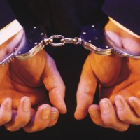 Credit Criminal in Cuffs